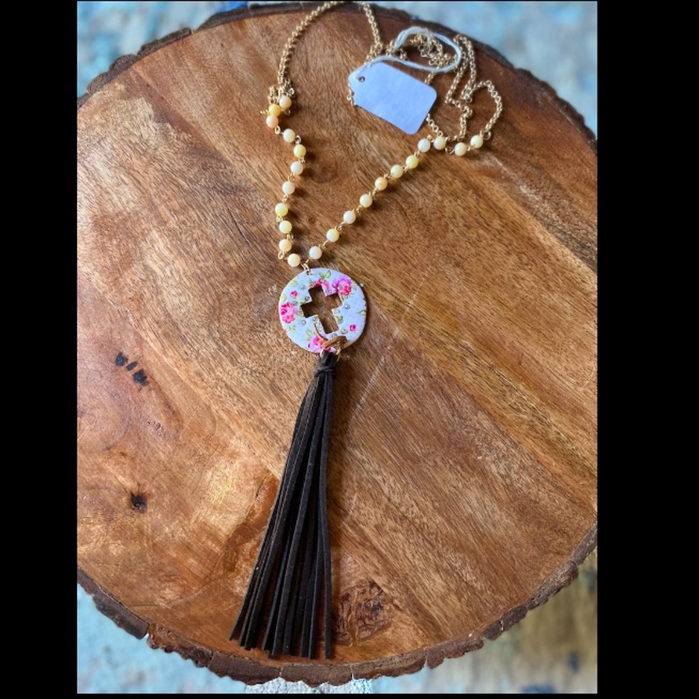 Floral cross necklace with tassel